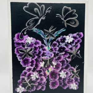 Original acrylic painting on canvas by NAKS by Kayla featuring a large butterfly silhouette formed by textured purple and white floral clusters, with ethereal light blue butterflies and leaves floating against a deep black background.