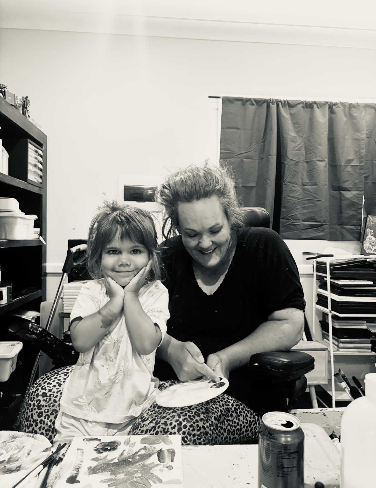 Self-taught Australian artist Kayla Sutton creating art with her young Great Niece in her home studio.